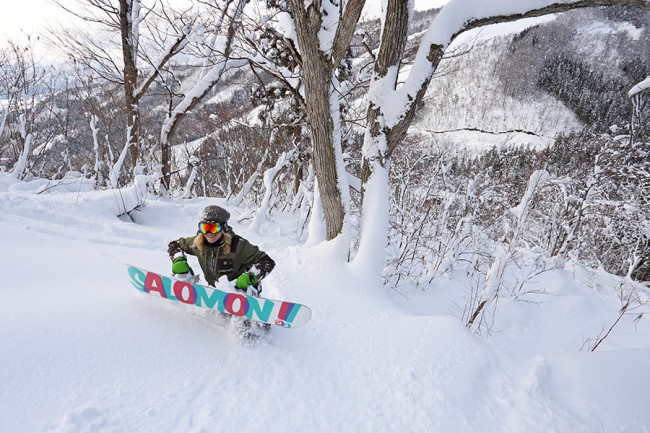 Judita climbs to access an un-riden line in the Nozawa Onsen trees.