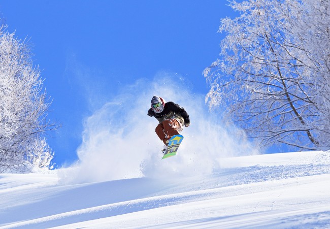 Yuto airs on a pristine powder run.