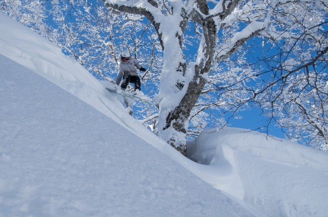 The rewards if skiing Japan in March. Kelsey getting some air time.