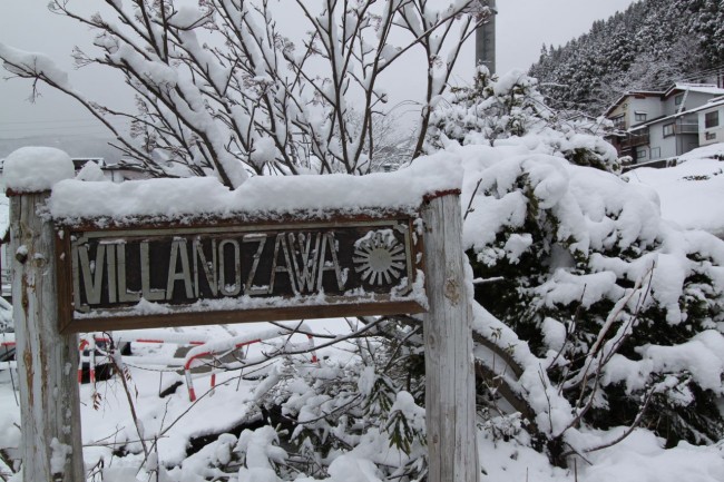 Has been a while since we saw snow on the sign. Welcome back to Nozawa Onsen 