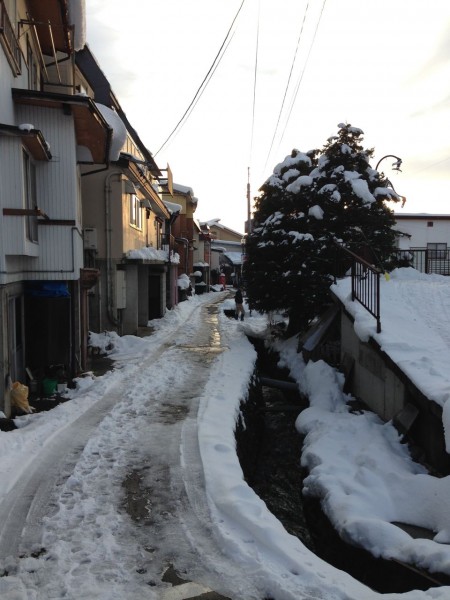 Sunset, small street , snow shovel Nozawa Style