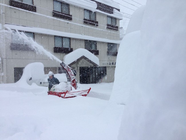 This shot was taken in December 14th 2014. We had to dig our way out of the house! The bumps on the right are cars!