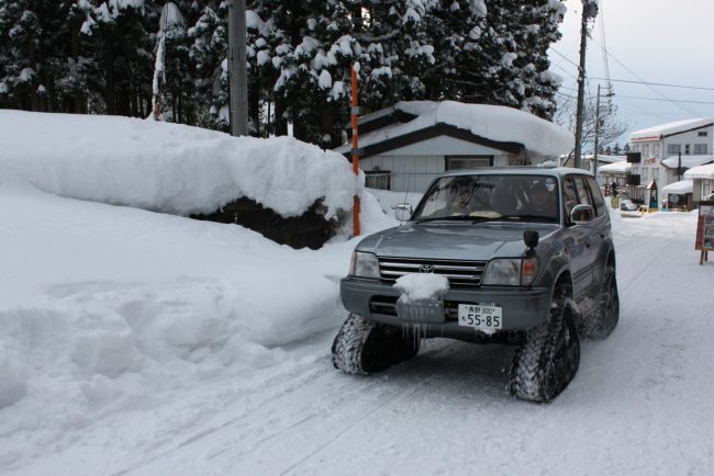These guys will deliver anywhere, anytime the Black Cat delivery service on the snow in Nozawa near Mt Dock