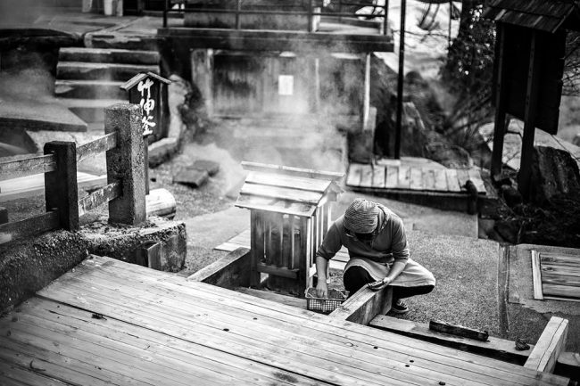 Probably the biggest appeal of Nozawa Onsen as a Cycling Tour or holiday destination is the culture. A local lady cooking vegetables on the Onsen. 