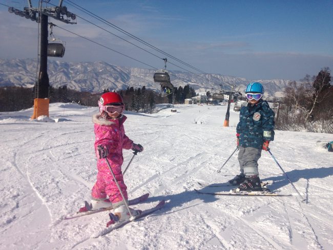 Kids enjoying free Sunday skiing on their Nozawa Weekend