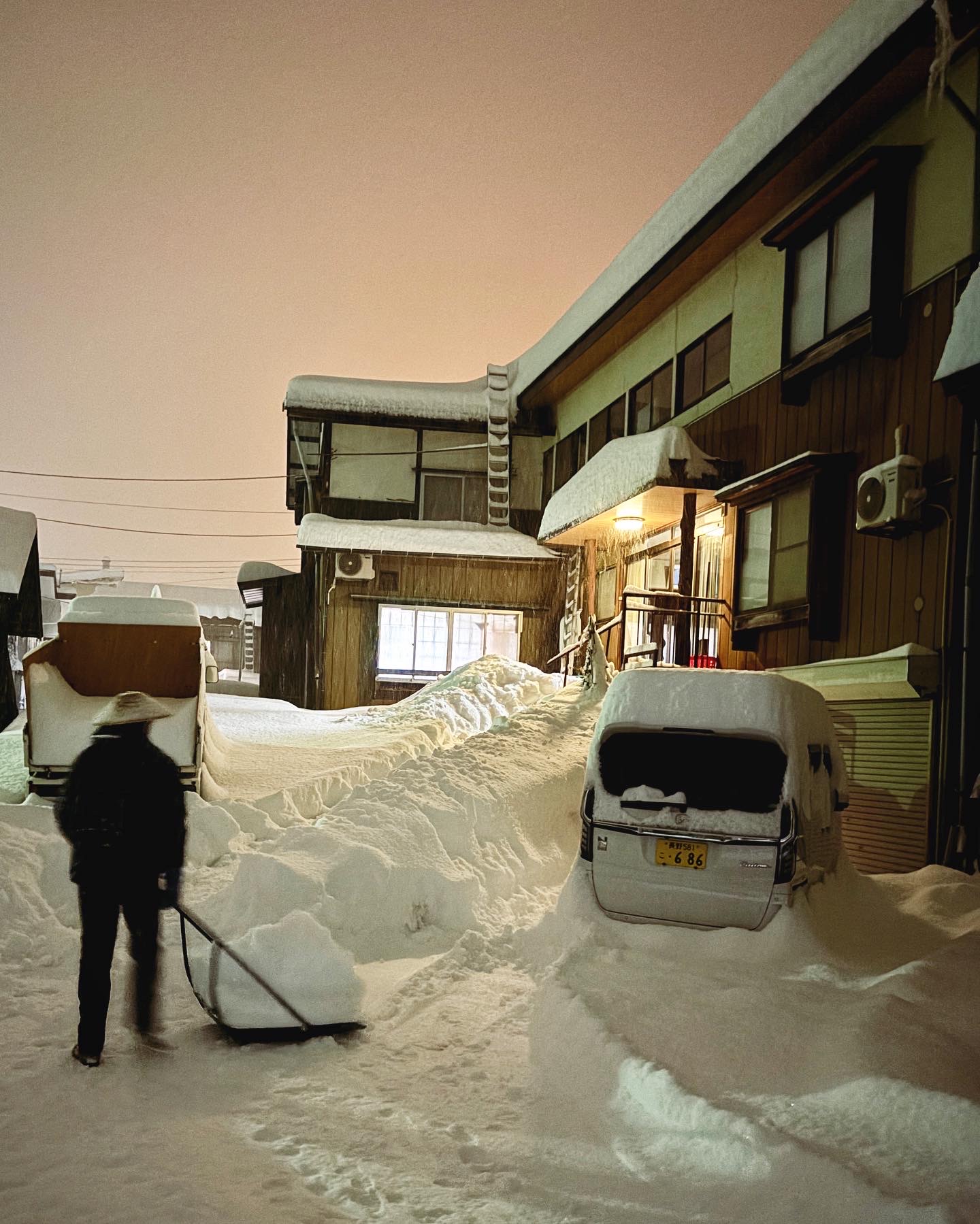 Night time in Nozawa Onsen snow shovelling 