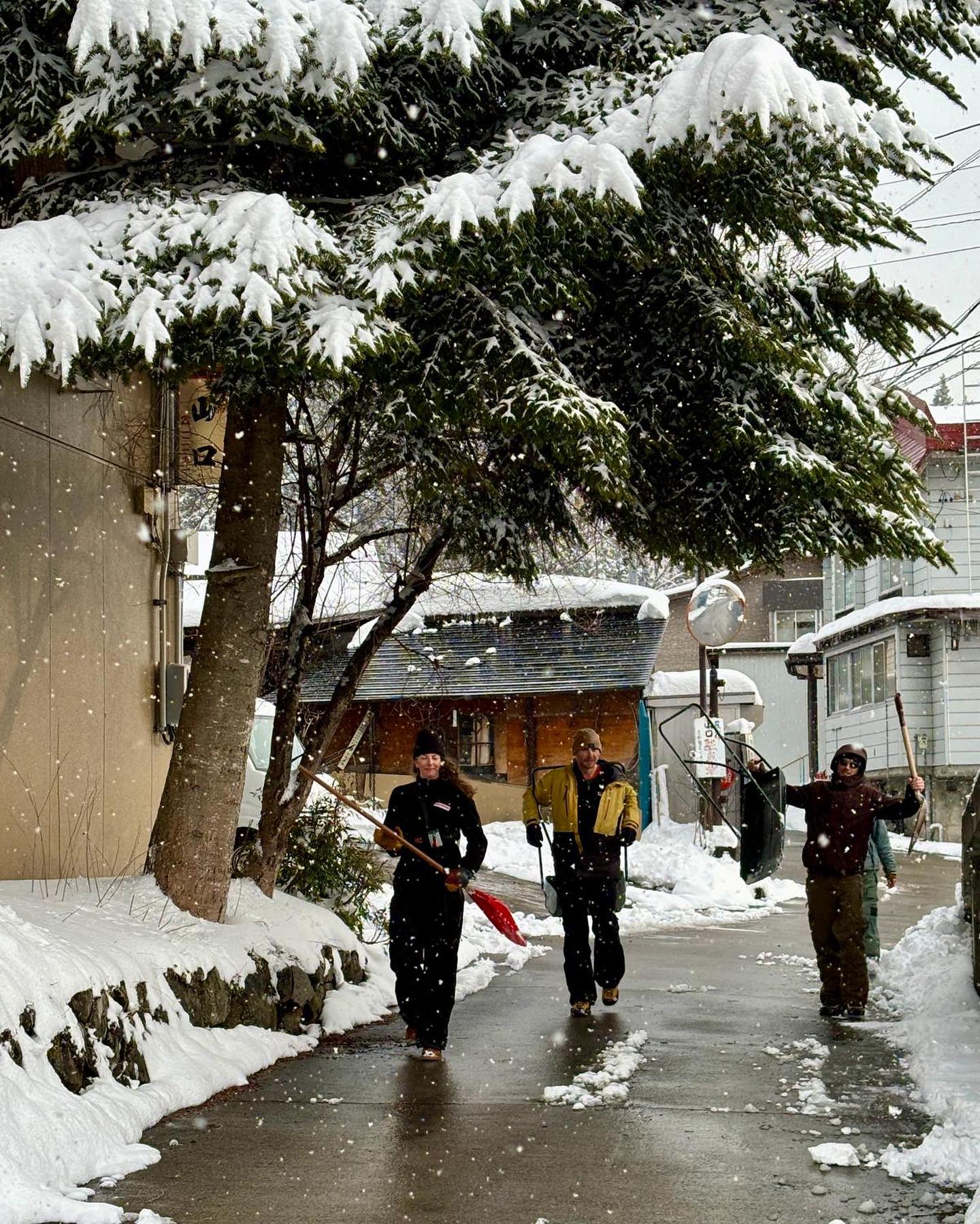 The snow surprise in late March keeping Nozawa Holidays staff busy!