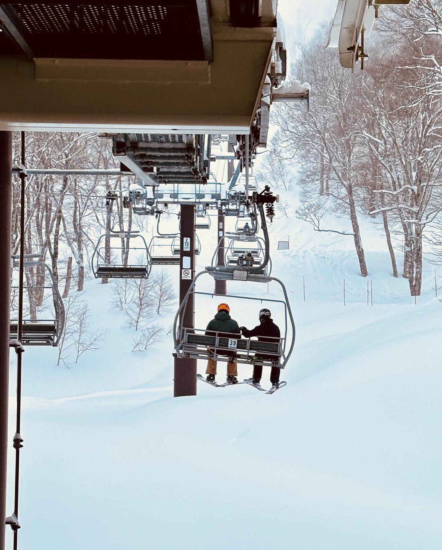 Lifts heading to the top of the mountain at Yamabiko for some fresh morning tracks