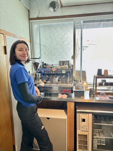 Emi serving best coffee in town near Nagasaka Gondola station at the Ski Locker