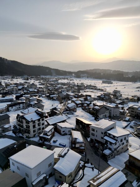 Birds eye view of Nozawa Onsen Village at the sunset in March