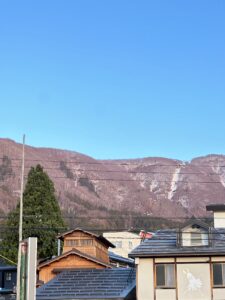 looking up the mountain in Nozawa with Shinden onsen