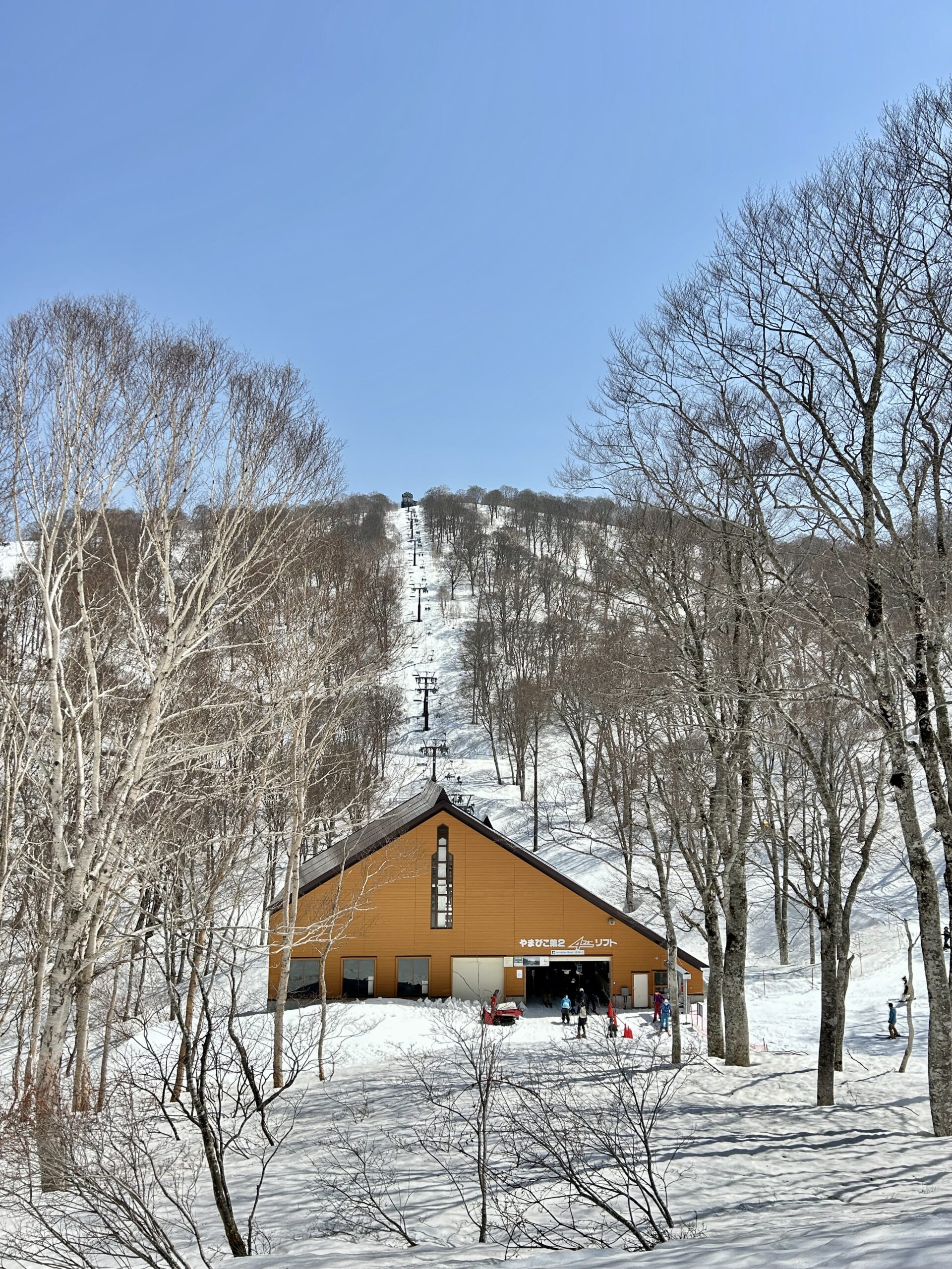 Another Spring sunny day in Nozawa Onsen with slopes still covered in Snow 