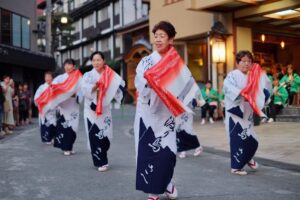 The town of Nozawa Onsen filled with people visiting for the Take no Ko bamboo festival
